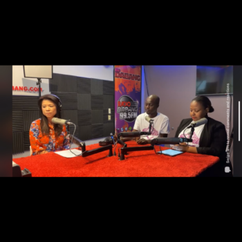 Three people recording in radio studio